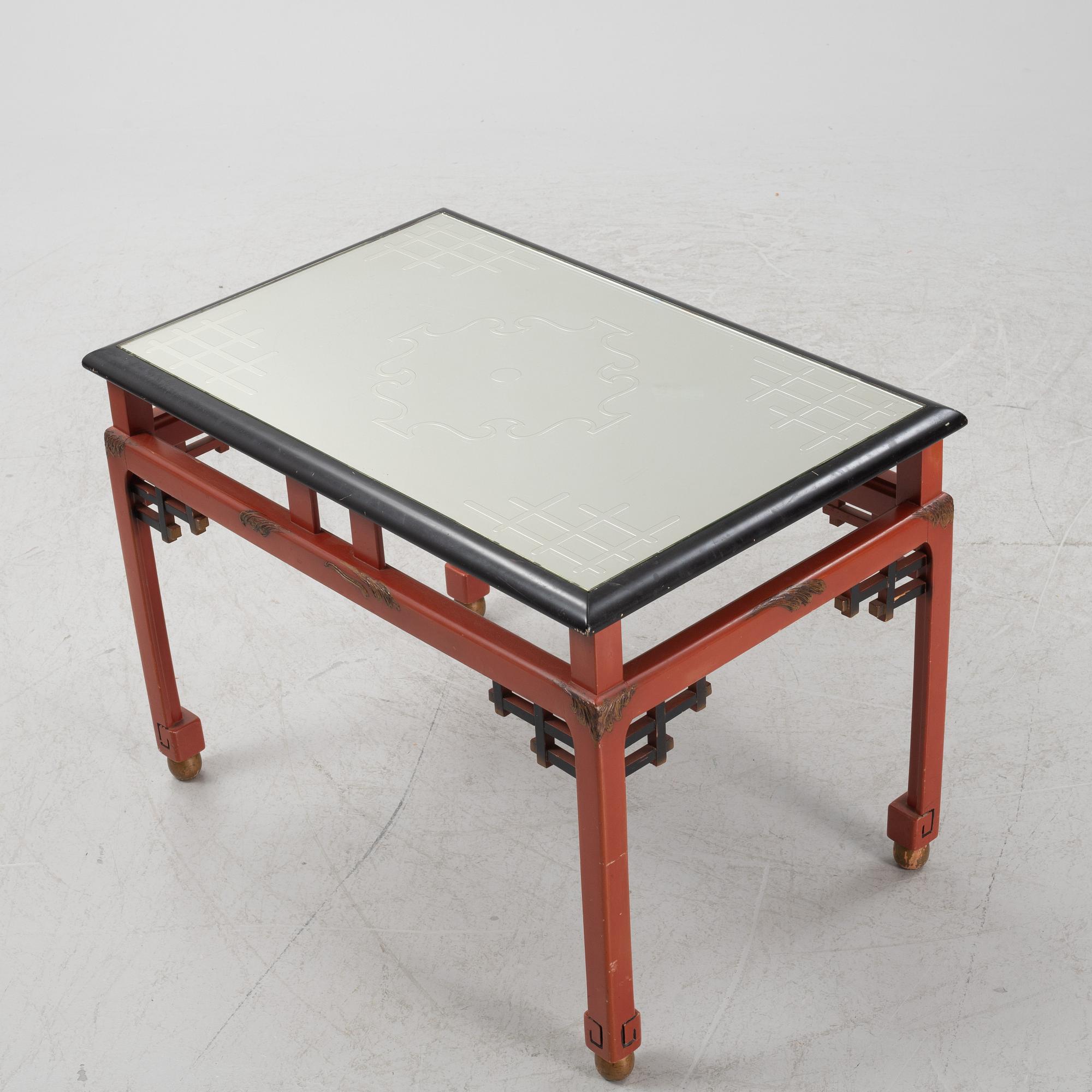 A Swedish Grace sofa, armchair and coffee table, Herbert Anderssons Möbelverkstäder, 1920's.