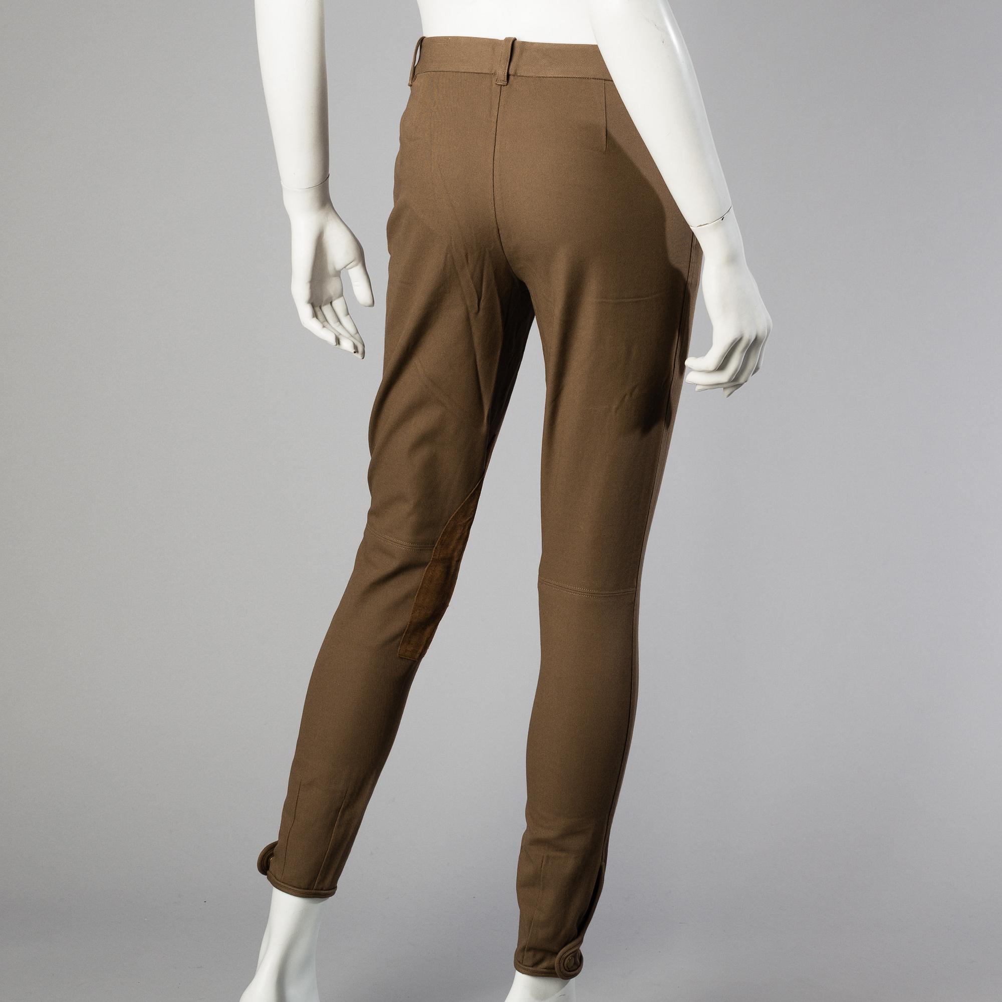 Three pair of trosers by Ralph Lauren.