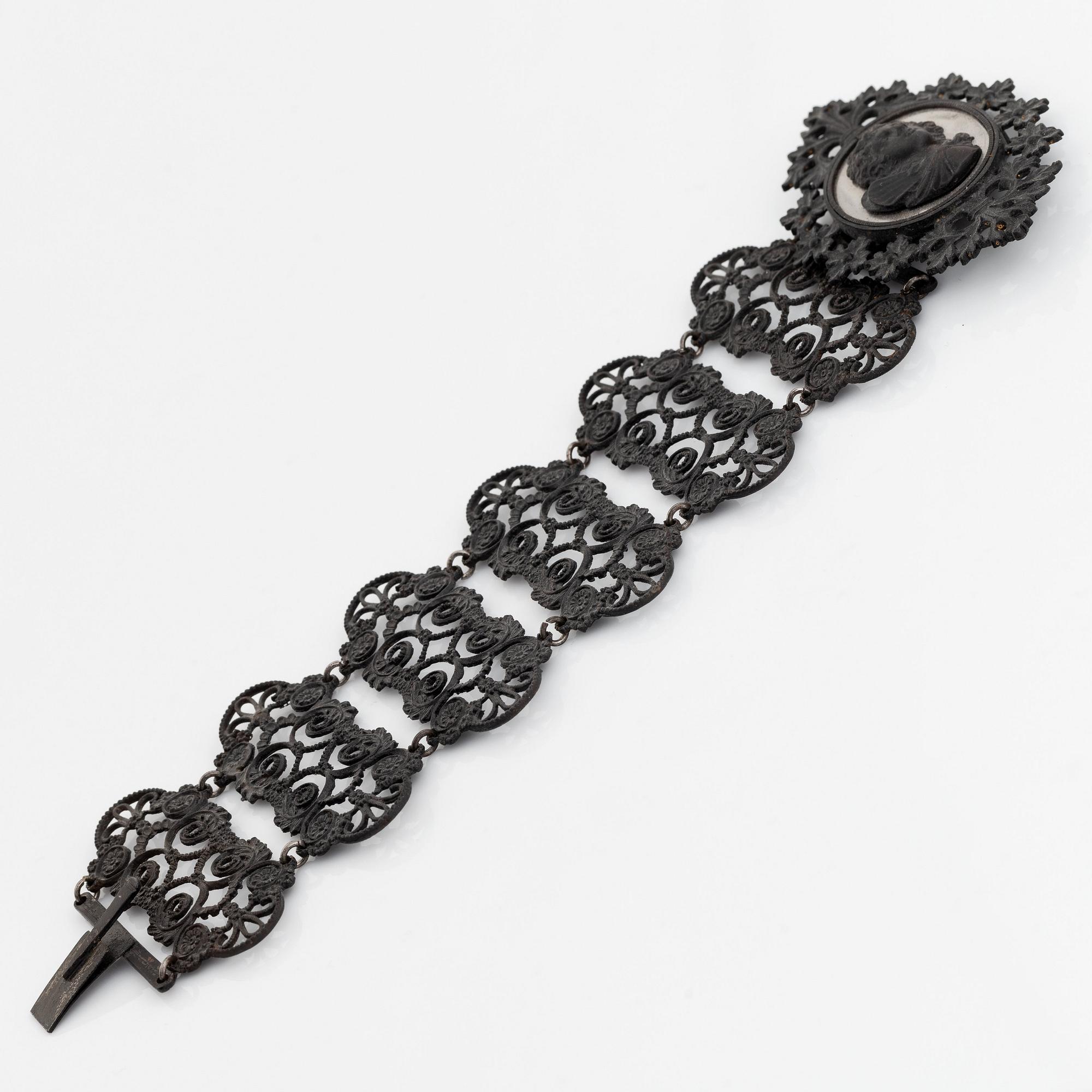 A Berlin iron and steel bracelet with a cameo.