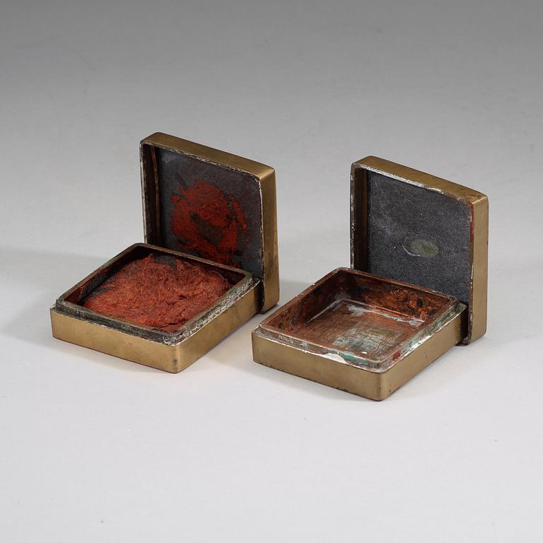 A pair of gilt copper seal boxes, Qing dynasty.