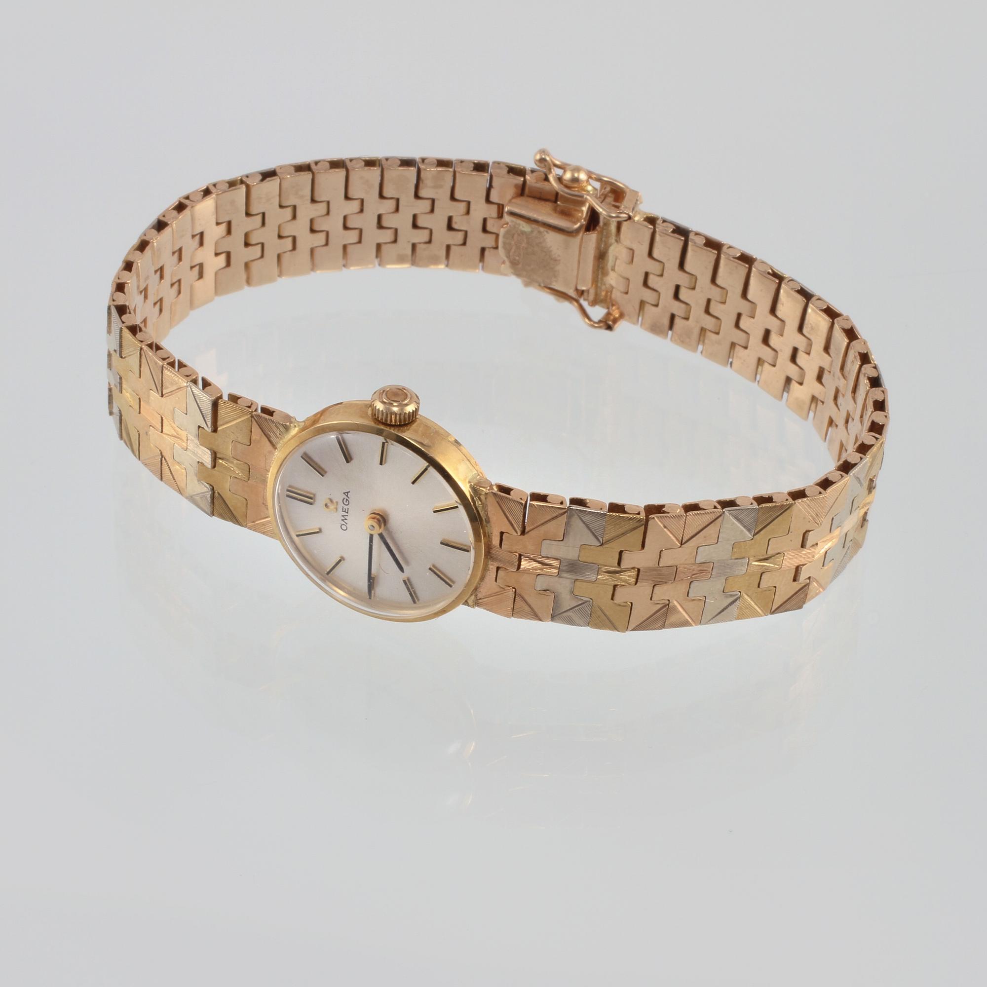 ARMBANDSUR, dam, 18K guld, Omega. Vikt 45,2 gram.