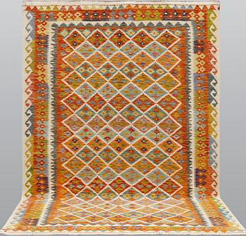 A kilim carpet, ca 306 x 203 cm.