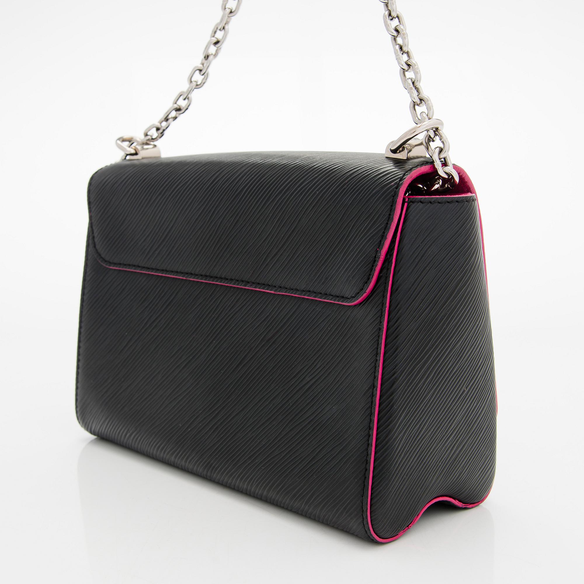 Louis Vuitton, a 'Twist MM Epi' bag.