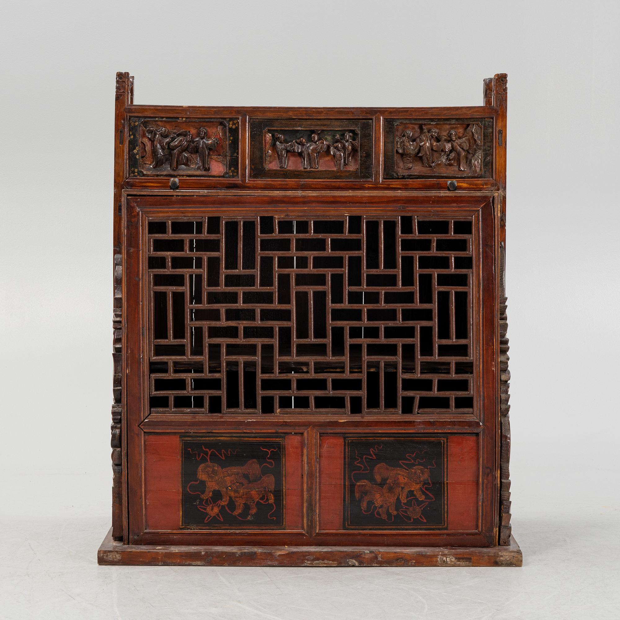 A cabinet, China, 20th century with older parts.