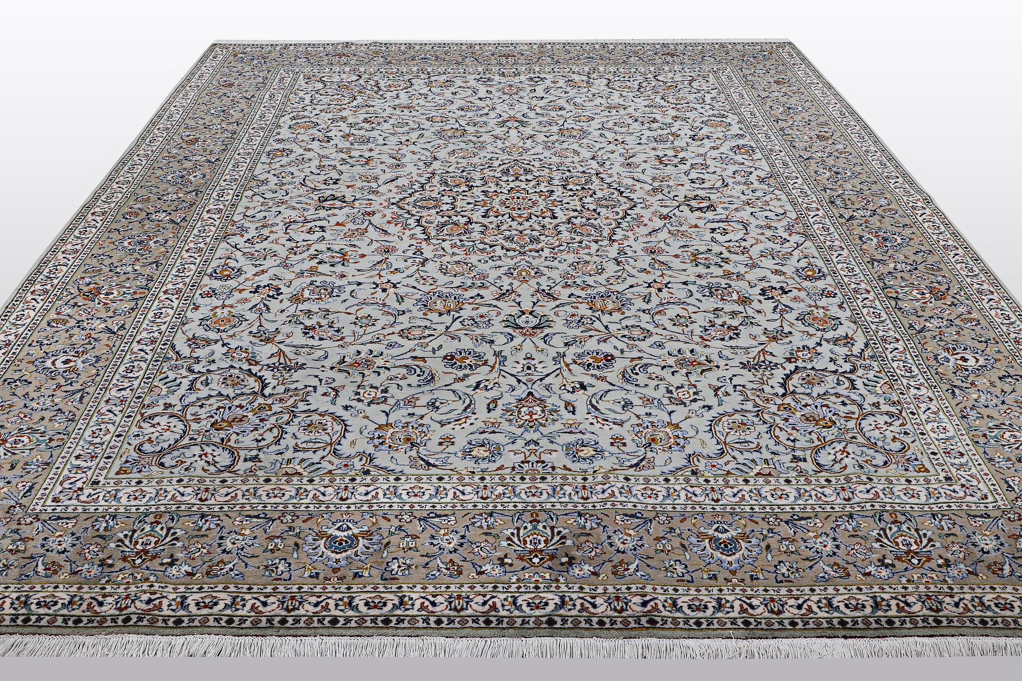 A carpet, Kashan, signed Fani, ca 420 x 300 cm.