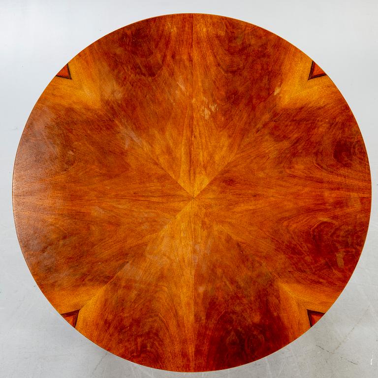 An Art Deco style walnut coffee table later part of the 20th century.