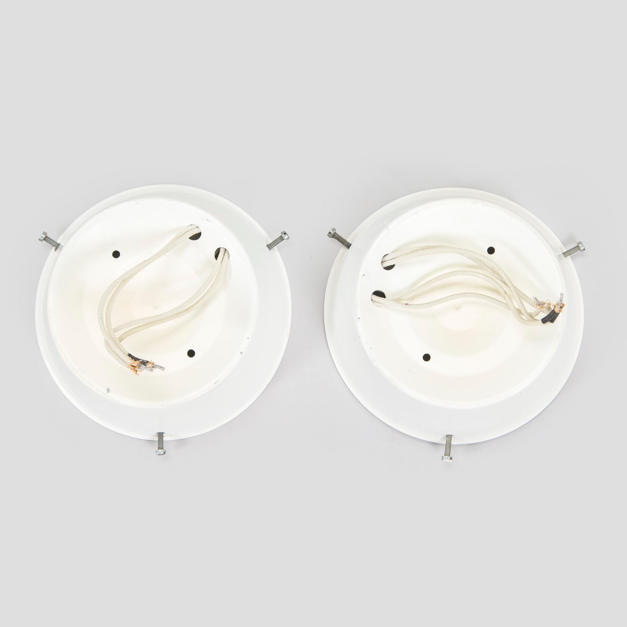 Arne Jacobsen, a pair of ceiling lamps/wall lamps, "AJ-Eklipta", Louis Poulsen, Denmark.