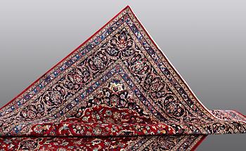 A carpet, Mashad, ca 346 x 248 cm.