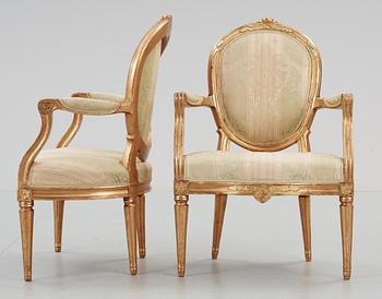 A pair of Gustavian late 18th Century armchairs.