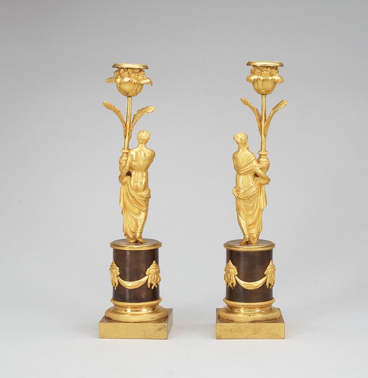 A pair of Louis XVI late 18th Century candlesticks.