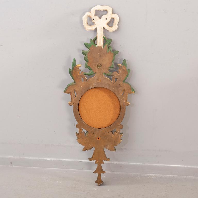 A pair of mid 20th century wood mirrors from Paoletti, Firenze Italy.