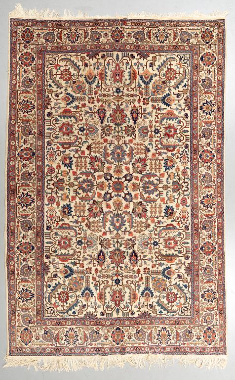 A carpet, semi-antique Tabriz,  342 x 231 cm.