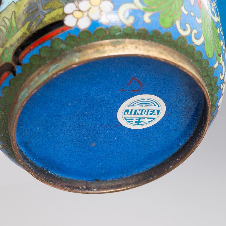 A pair of Chinese table decorations in various stones, enamelled pots. The latter half of the 20th century.