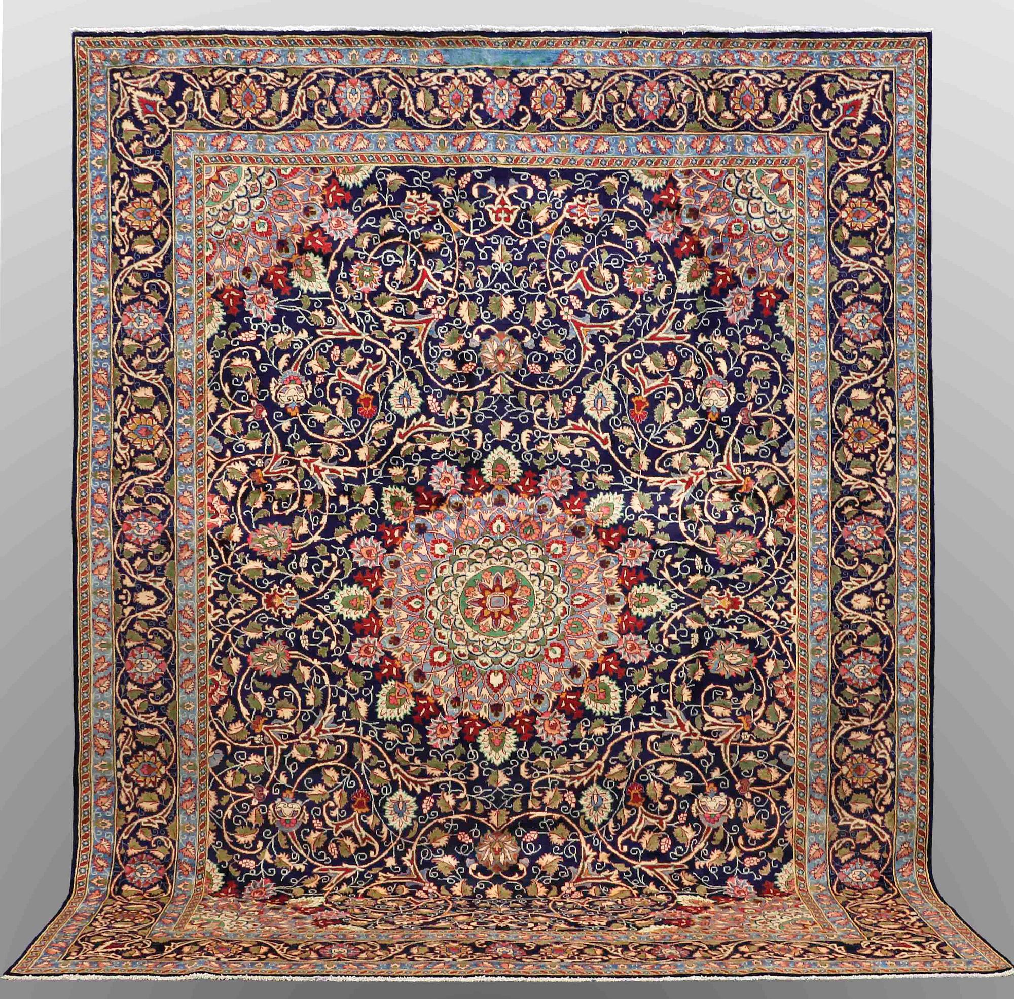 A carpet, Kashmar, signed, ca 390 x 295 cm.