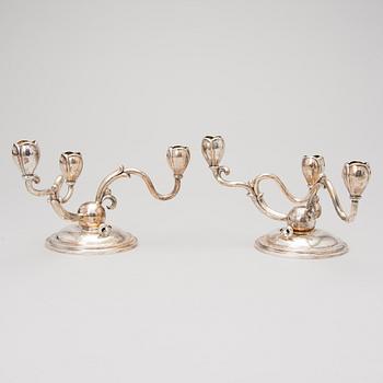 A pair of three arm silver candelabra, mark of W.A. Bolin, Stockholm 1934.