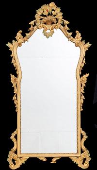 An mid 20th century Louis XV-style mirror from Paoletti, Firenze Italy.