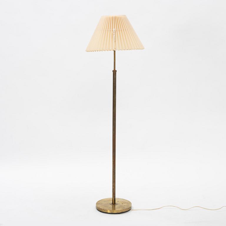 A brass floor light, seond part of the 20th Century.