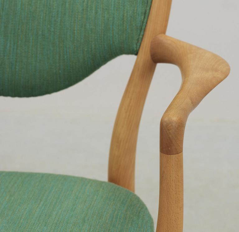 A Finn Juhl dining set of a teak and beech table, four beech 'BO-63' chairs and two armchairs, Bovirke. Denmark.