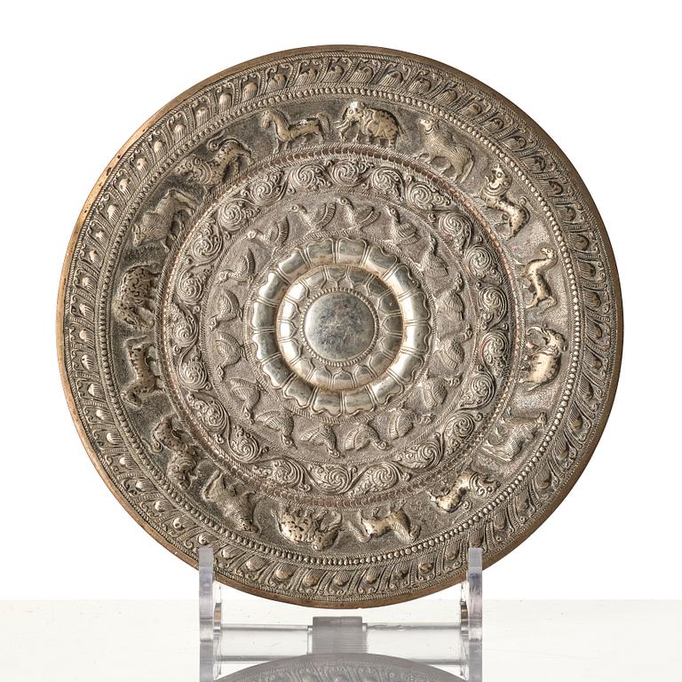 A Chinese brushpot, Qing dynasty, circa 1900. An archaistic bronze ewer and a silvered South East Asian bowl with stand.