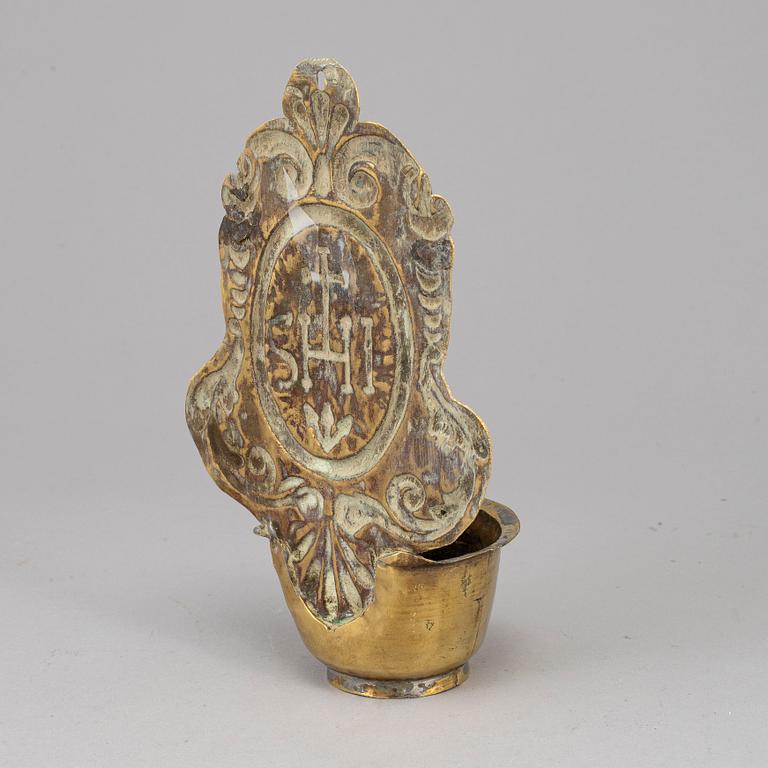 An 18th century brass Holy Water bowl.