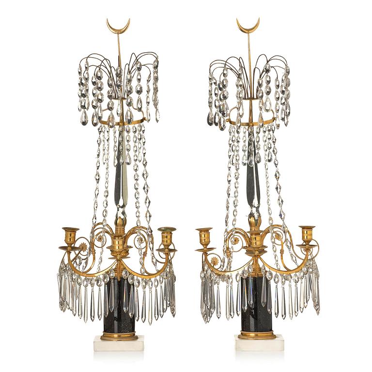 A pair of late Gustavian ormolu and marble three-light candelabra, Stockholm, late 18th century.