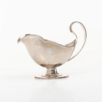 Sauceboat and four punch cups, silver, Sweden, 20th century.