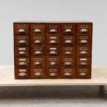 A pine cabinet with drawers, first half of the 20th Century.