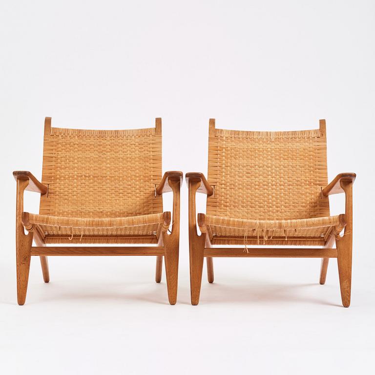 Hans J. Wegner, a pair of oak and rattan 'CH27' chairs, Carl Hansen & Søn, Odense Denmark 1950s-1960s.