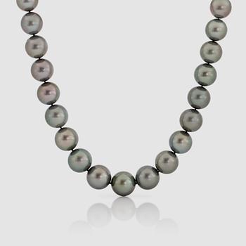 1111. A cultured Tahiti pearl, 12-15.3 mm, and diamond necklace.