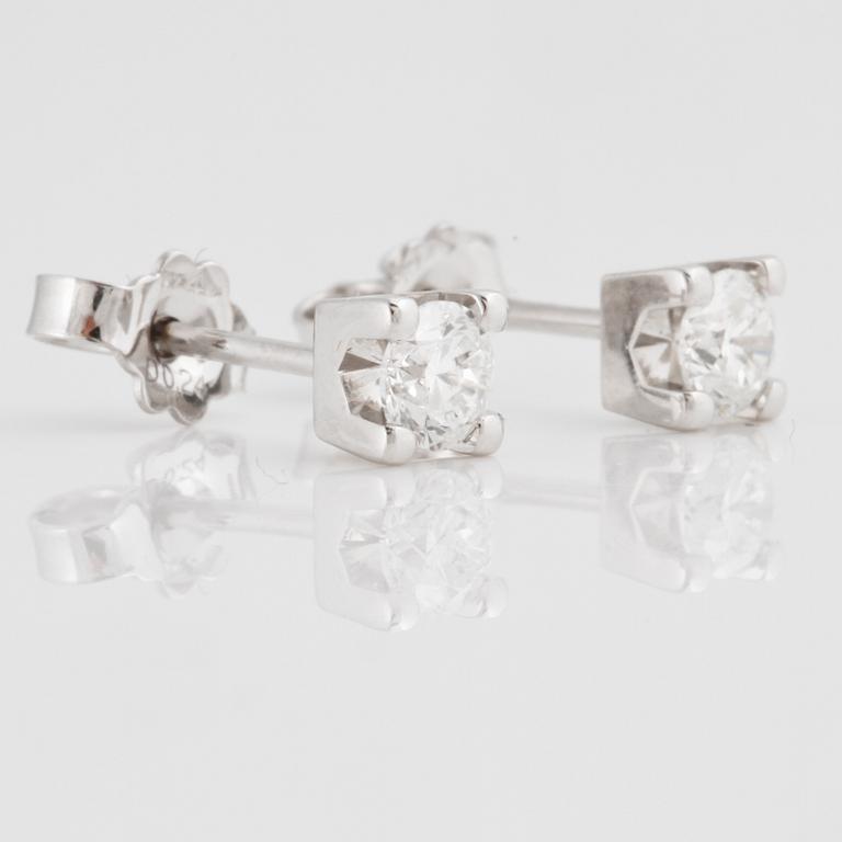 A pair of brilliant-cut diamond earrings. Total carat weight 0.48 cts.