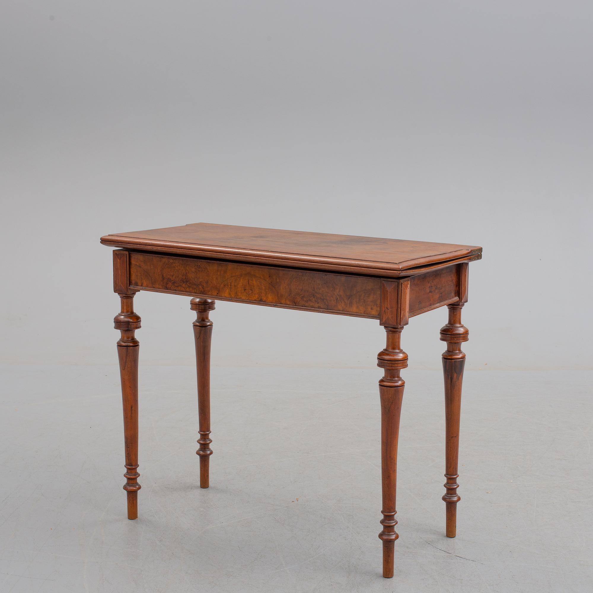 A late 19th century mahogany card table.