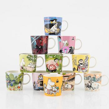 Eleven porcelain Moomin mugs, Arabia, Finland.