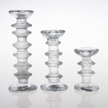 TIMO SARPANEVA, SEVEN FESTIVO GLASS CANDLESTICKS, Iittala, partly signed TS.