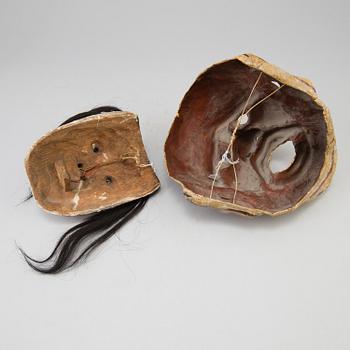 A group of dancing maskes, mostly Japanese Bugagku masks, Meiji period (1868-1912).