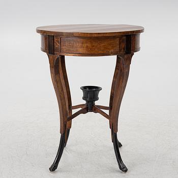 An Empire table, northern Europe, early 19th century.