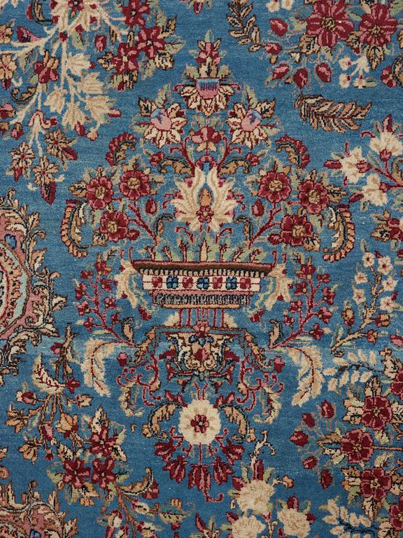 A semi-antique Kerman carpet,  440 x 296 cm.