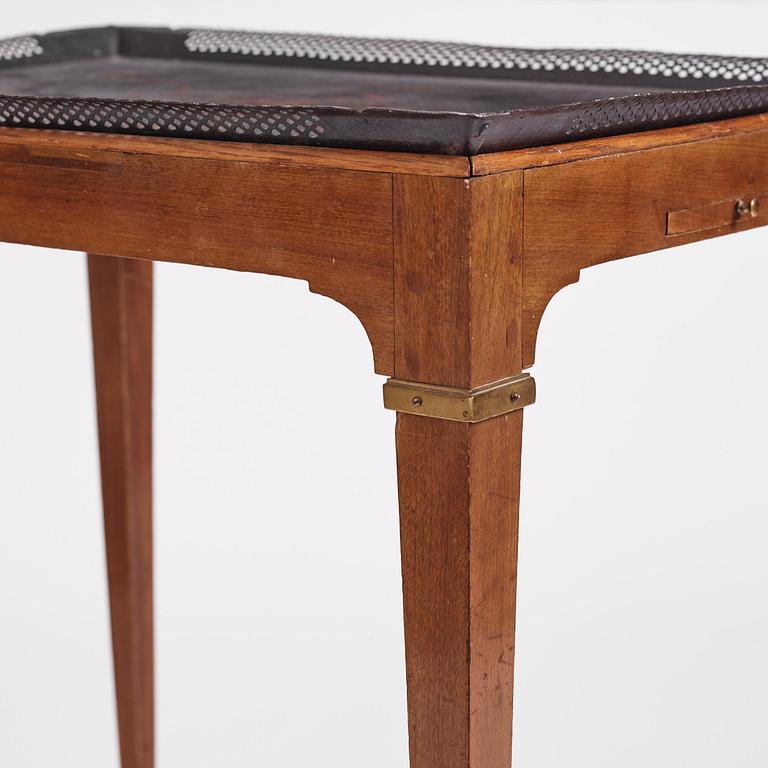 A late Gustavian tôle-peinte and mahogany tray-table from the workshop of Georg Haupt, Stockholm, late 18th century.