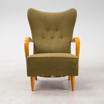 A 1940's wingback armchair.