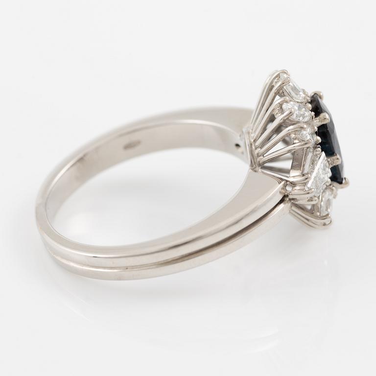 Ring, 18K white gold with sapphire and trapeze- and navette-cut diamonds.