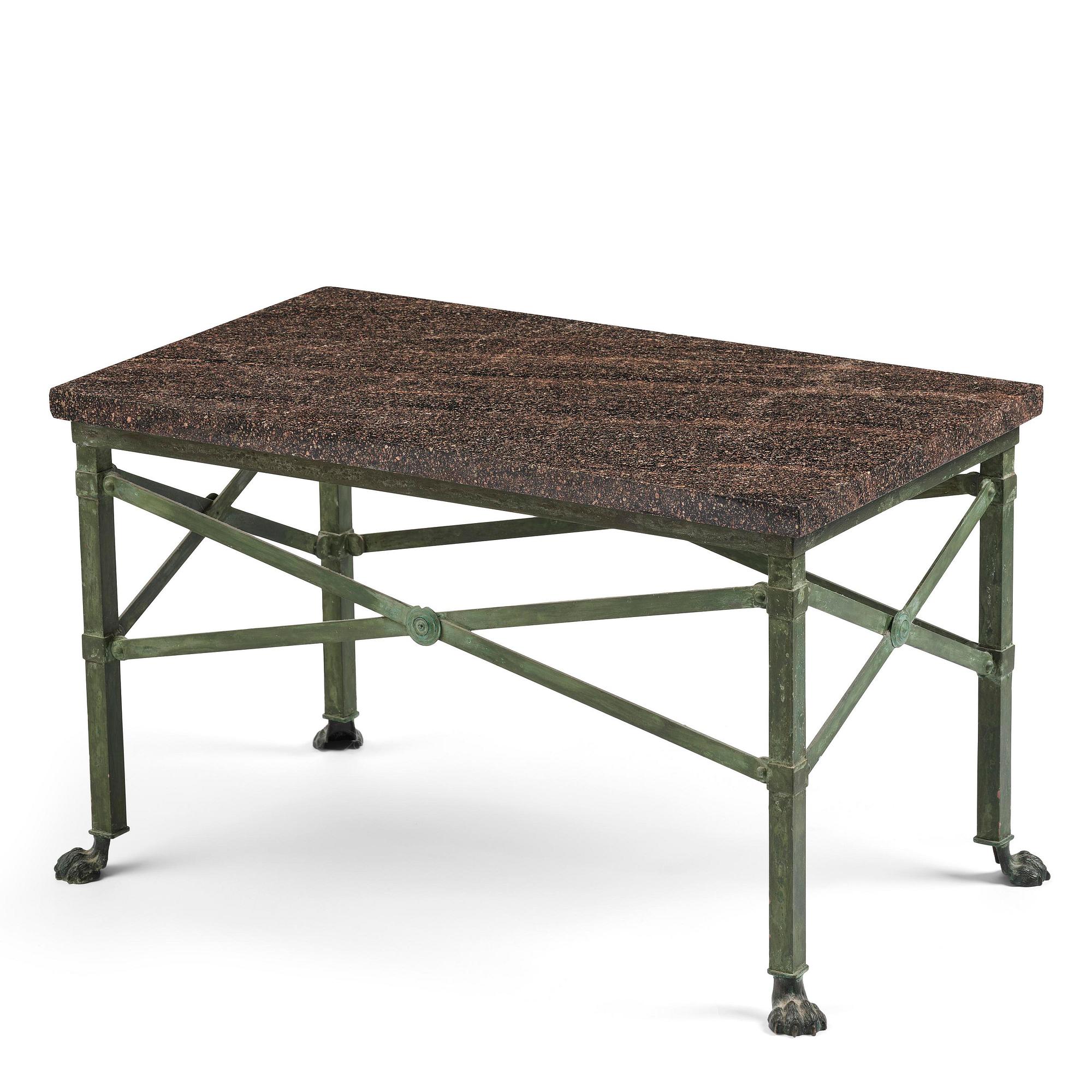 A table with Swedish 'Orrlok' porhyry top, early 19th century on a later bronze stand.