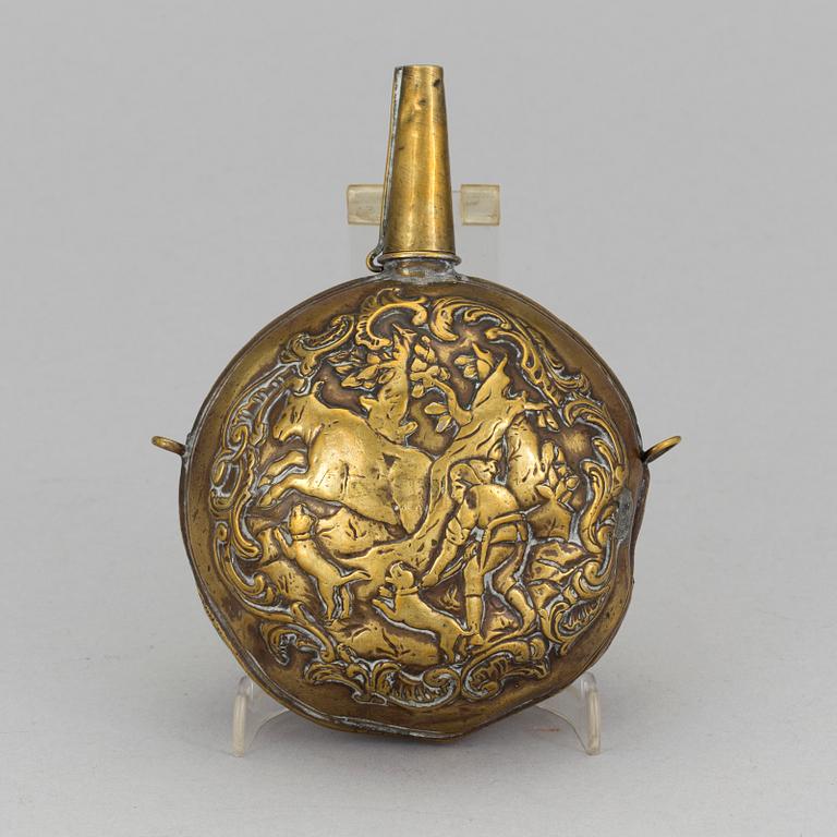 A mid 18th century brass powder flask.