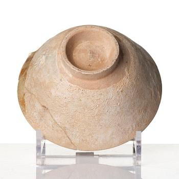 A Persian pottery bowl  13th century.