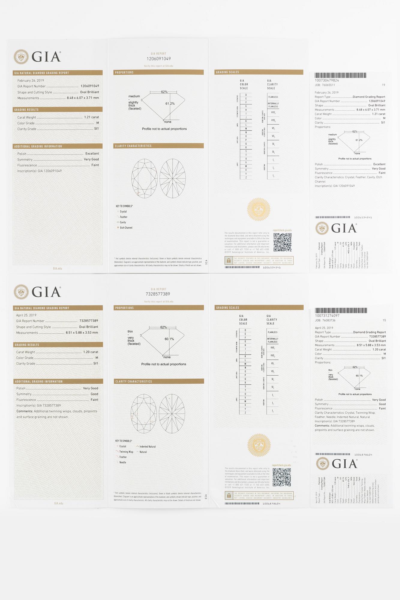 Earrings 18K white gold set with oval-cut diamonds, accompanied by GIA report.