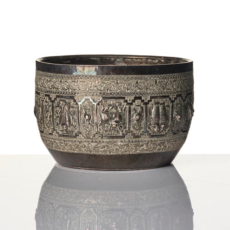 A Chinese brushpot, Qing dynasty, circa 1900. An archaistic bronze ewer and a silvered South East Asian bowl with stand.