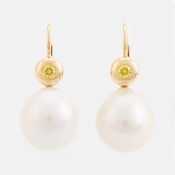 Freshwater pearl and colour treated yellow diamond earrings.