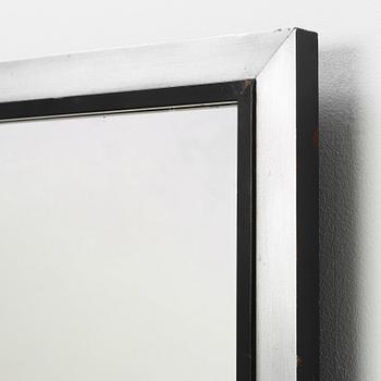 A Swedish modernist  black lacquered and pewter wall mirror and table, 1930's.