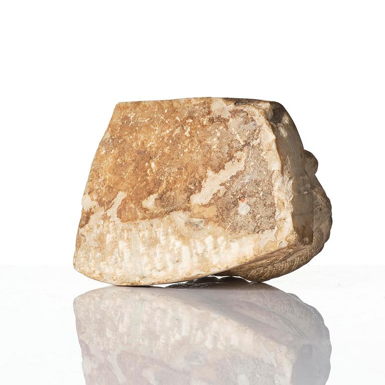 A stone figure of a mythical beast, probably Tang dynasty (618-907).