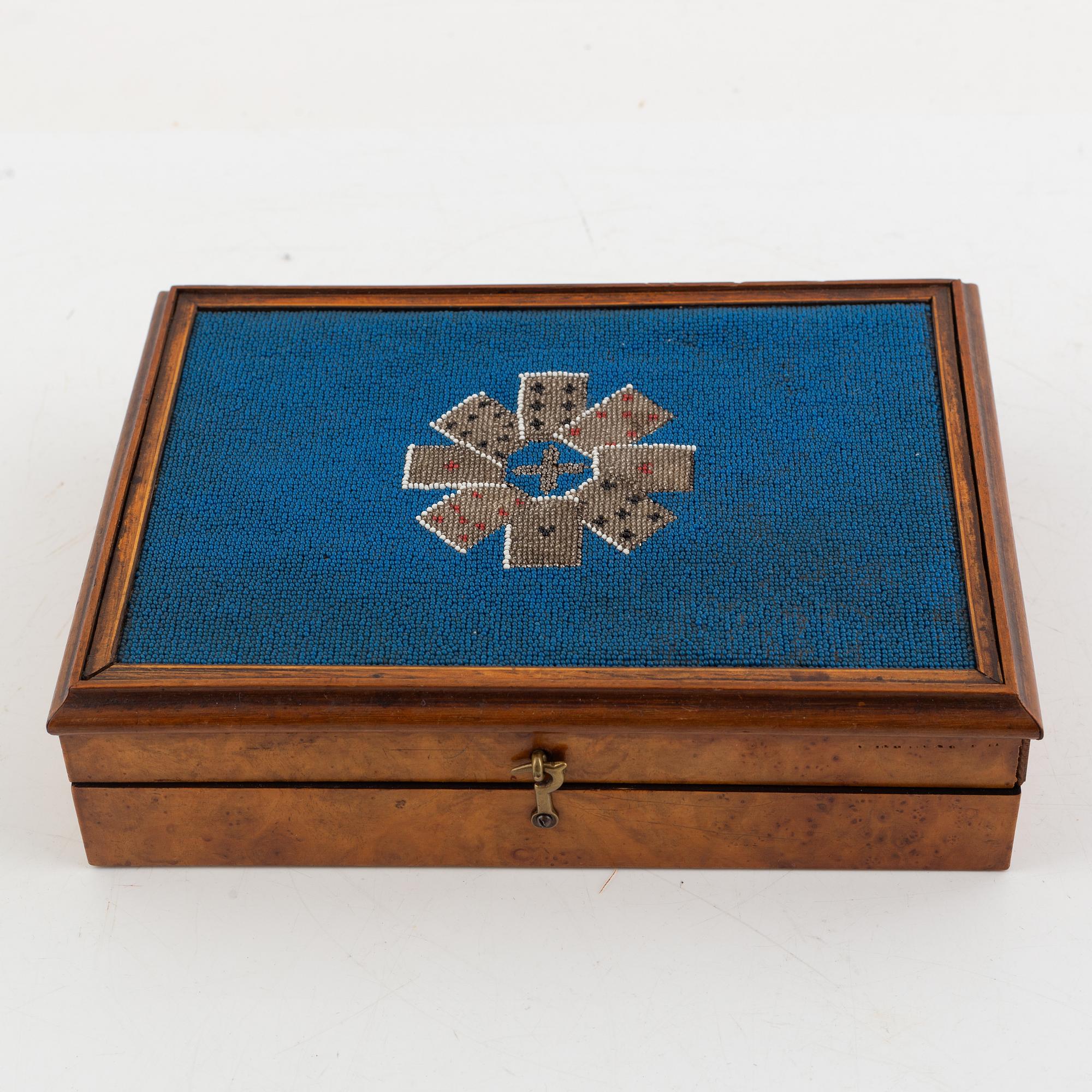 A set of six Chinese ink rubbings, two board games and a box with glass pearl embroidery.