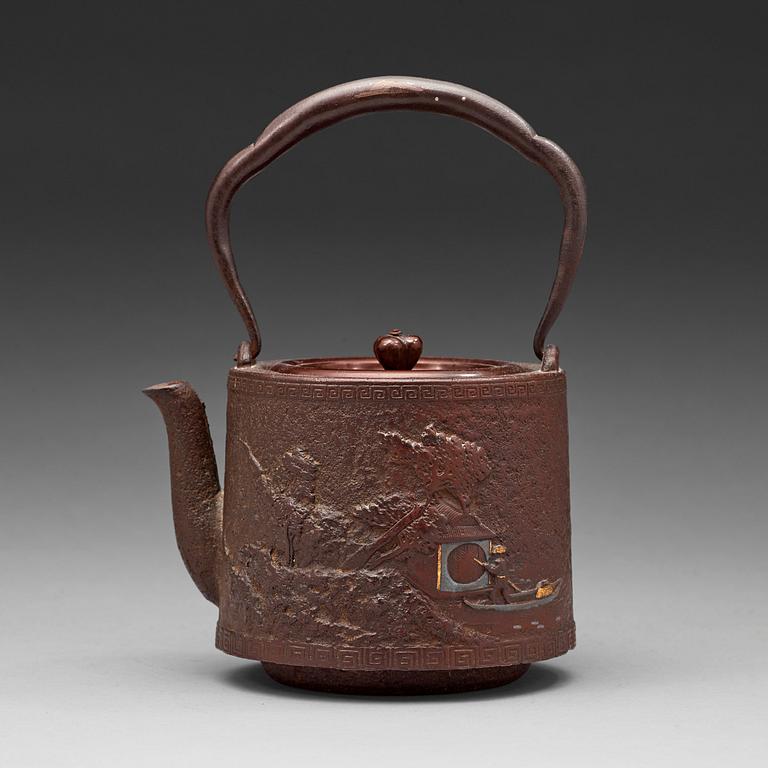 A Japanese iron and bronze tea pot with cover, Meiji period 1868-1912).