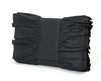 A black silk evening bag by Christian Dior.